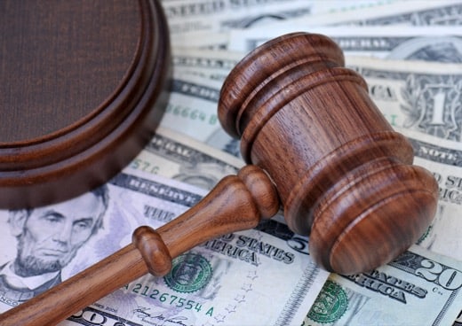 Judge's gavel and money, car accident compensation