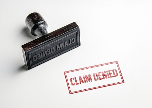 Stamp and the words claim denied, concept of North Augusta car accident lawyer
