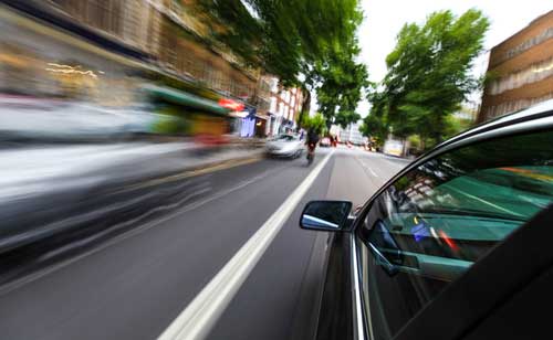 Speeding car, concept of Wilmington reckless driving accident lawyer